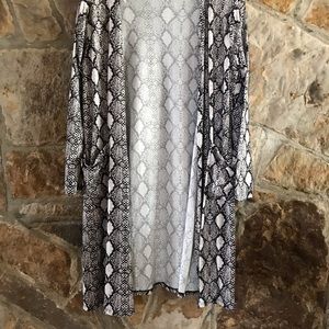 Snake skin duster. Never worn. Washed once.